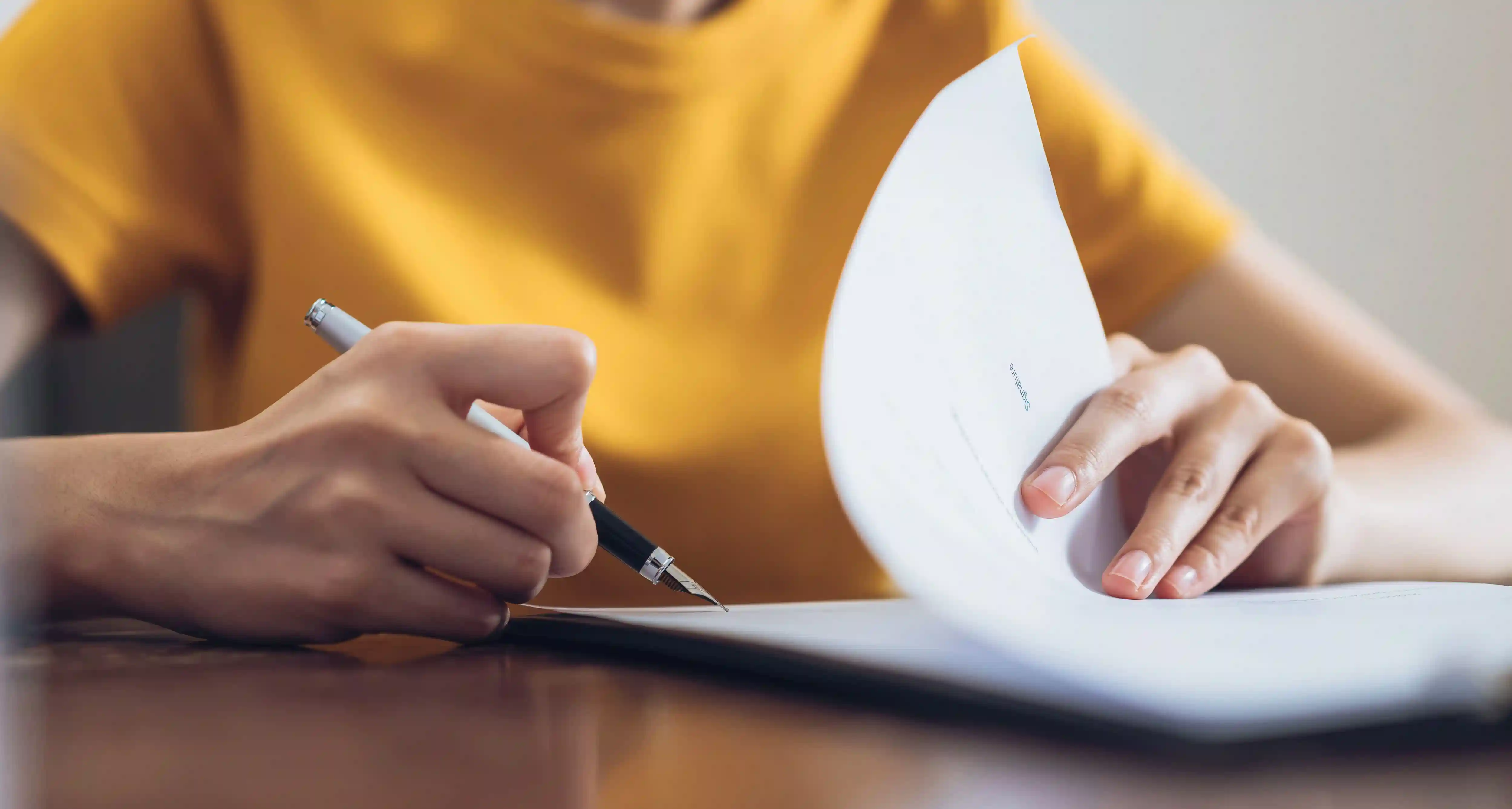 Woman filling out insurance forms