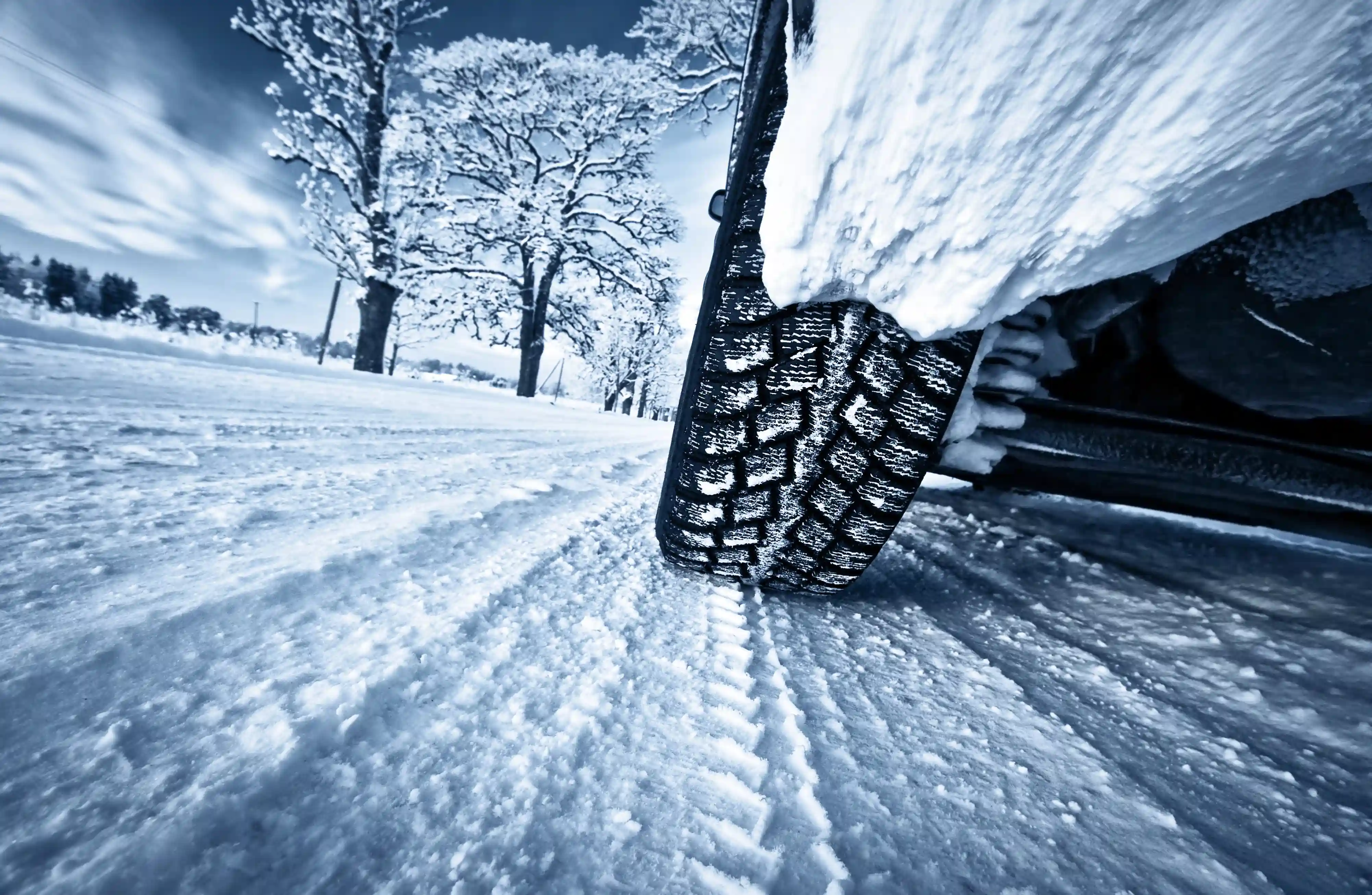 Car tires on a winter road
